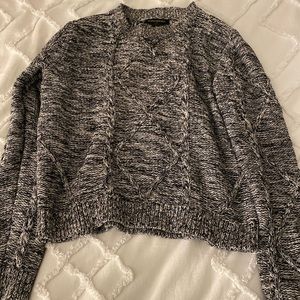 Grey and black cable knit sweater
